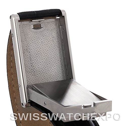 The image shows the Cartier Tank Basculante Men's Stainless Steel Silver Dial Men's Stainless Steel Silver Dial model from the side, with its case in a tilted open position.