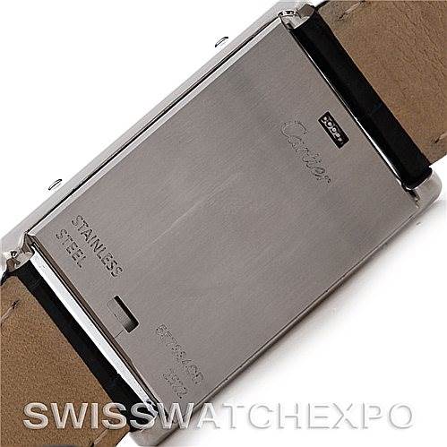 The image shows the back of a stainless steel Cartier Tank Basculante Men's Stainless Steel Silver Dial Men's Stainless Steel Silver Dial watch case with inscriptions and leather straps partially visible.