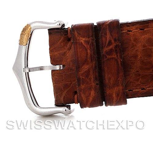 The image shows a close-up of the leather buckle and strap of a Cartier Tank Basculante Men's Stainless Steel Silver Dial Men's Stainless Steel Silver Dial watch.