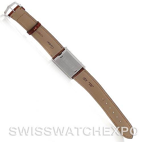 The image shows the back view of a Cartier Tank Basculante Men's Stainless Steel Silver Dial Men's Stainless Steel Silver Dial watch with emphasis on the leather strap and clasp.