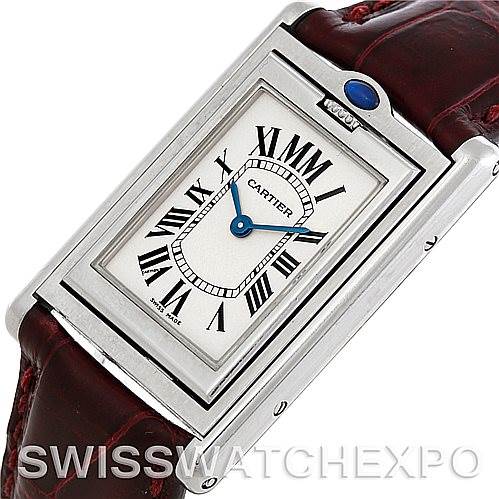 This image shows a close-up, angled view of the Cartier Tank Basculante 2405 Women's Stainless Steel Silver Dial 2405 Women's Stainless Steel Silver Dial watch, highlighting its face and part of the strap.