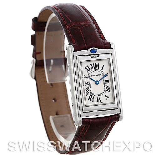The photo shows a Cartier Tank Basculante 2405 Women's Stainless Steel Silver Dial 2405 Women's Stainless Steel Silver Dial watch at a slight angle, highlighting its face, strap, and unique swiveling case design.