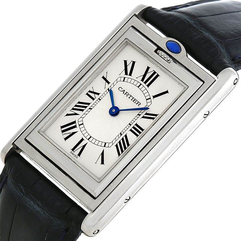 The image shows a Cartier Tank Basculante Men's Stainless Steel Silver Dial Men's Stainless Steel Silver Dial watch at a slight angle, highlighting the dial, crown, and leather strap.