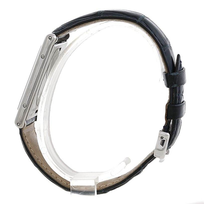 The image shows a side view of the Tank Basculante model watch by Cartier, displaying its strap and clasp.