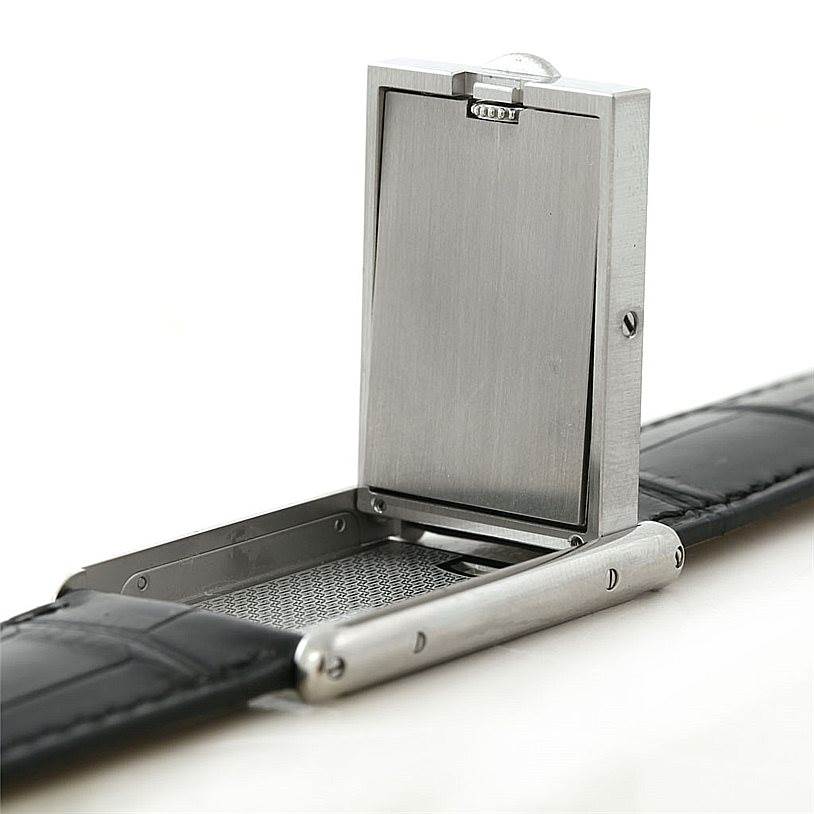 The image shows a Cartier Tank Basculante W1011358 Men's Stainless Steel Silver Dial W1011358 Men's Stainless Steel Silver Dial watch from a side angle, highlighting its pivoting mechanism and part of the strap.