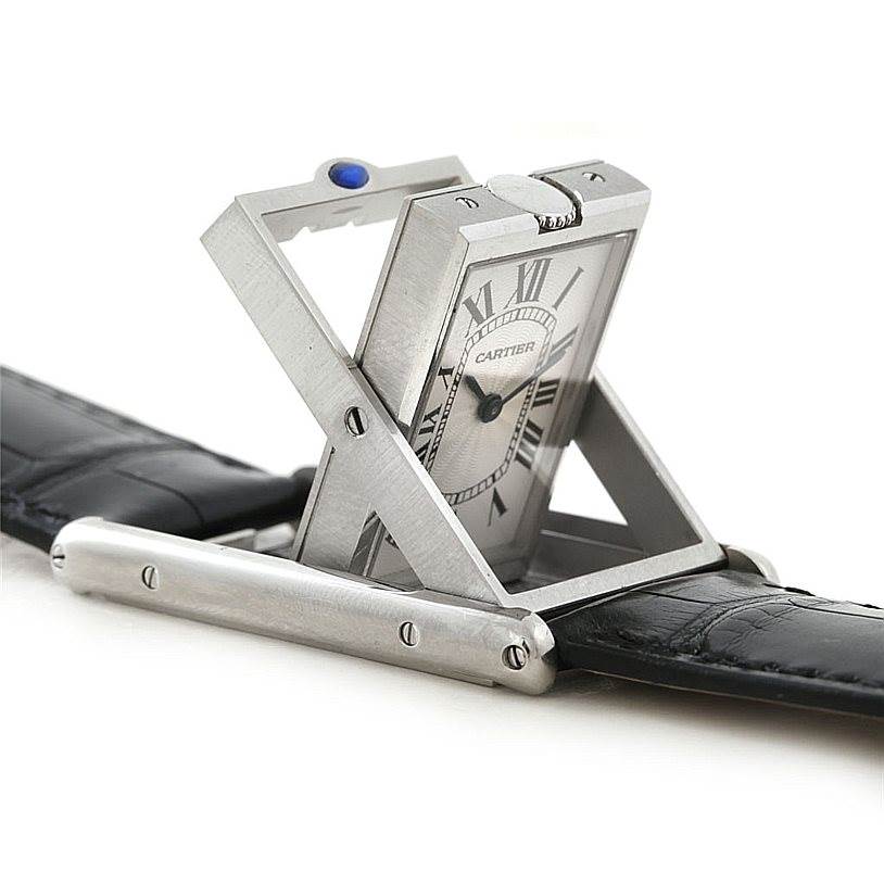 The Cartier Tank Basculante W1011358 Men's Stainless Steel Silver Dial W1011358 Men's Stainless Steel Silver Dial watch is shown at an angle displaying its swiveling case and black leather strap.