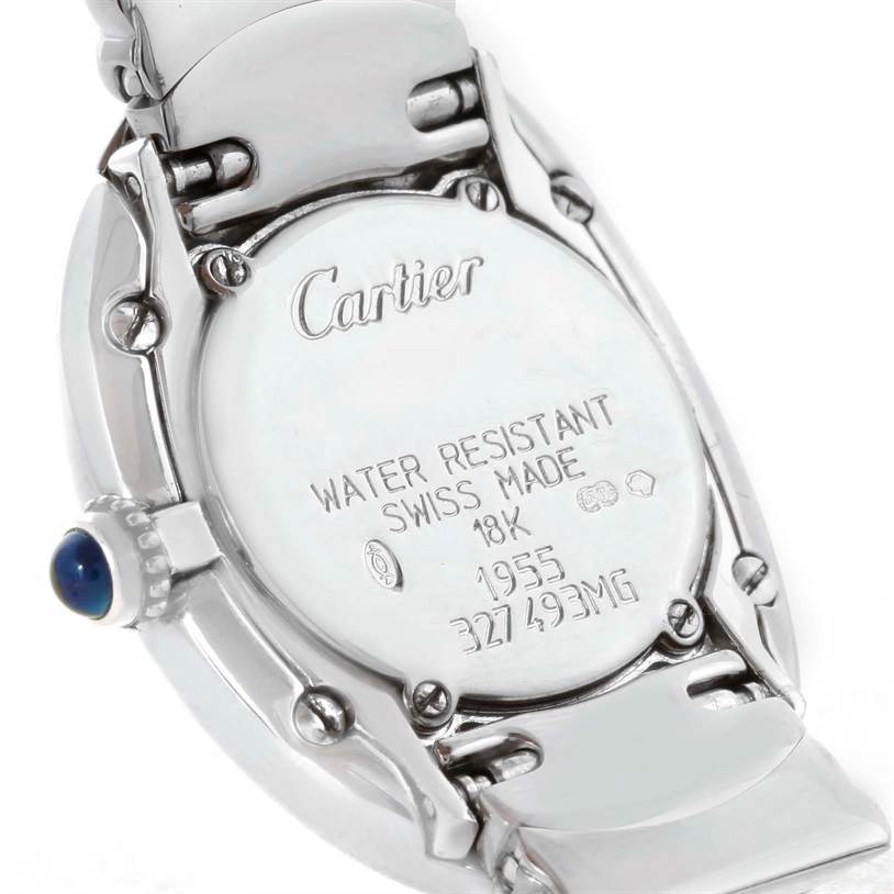 This image shows the back of a Cartier Baignoire W15133L2 Women's White Gold Silver Dial W15133L2 Women's White Gold Silver Dial watch, highlighting its water resistance, metal markings, and serial numbers.