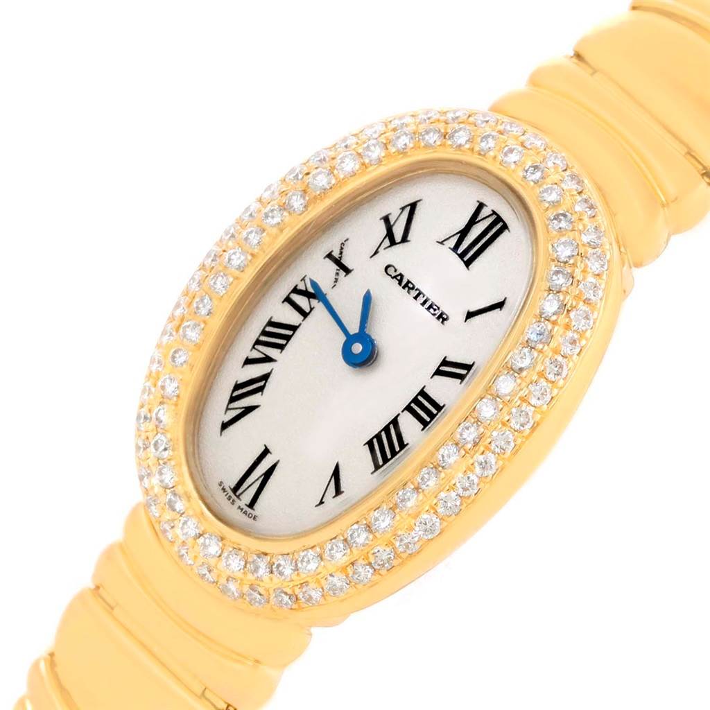 The image shows a close-up, slightly angled view of the Cartier Baignoire WB5094D8 Women's Yellow Gold Silver Dial WB5094D8 Women's Yellow Gold Silver Dial watch face and part of its band.