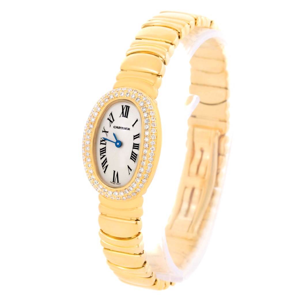 The Cartier Baignoire WB5094D8 Women's Yellow Gold Silver Dial WB5094D8 Women's Yellow Gold Silver Dial watch is shown at an angled side view, highlighting the oval face, bezel, and bracelet.
