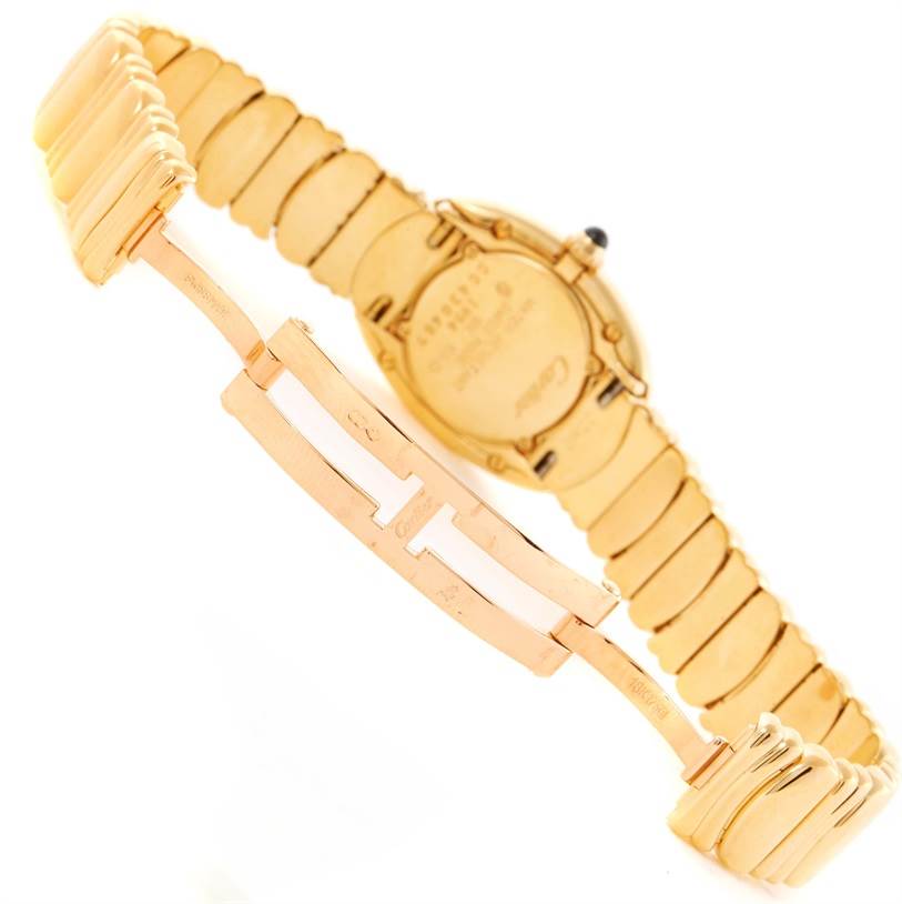 This image shows the back view of the Cartier Baignoire Women's Yellow Gold Silver Dial Women's Yellow Gold Silver Dial watch, focusing on its gold bracelet and clasp.