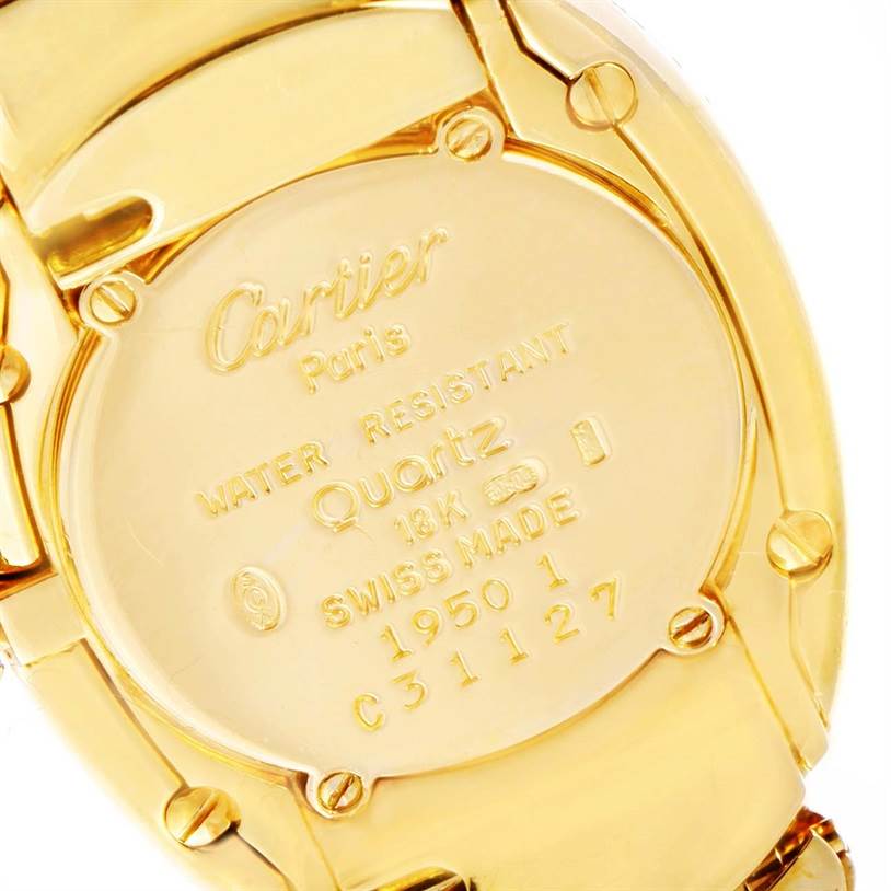 This image shows the back case of the Cartier Baignoire 1950 Women
s Yellow Gold Silver Dial 1950 Women
s Yellow Gold Silver Dial watch, displaying its engravings and gold finish.