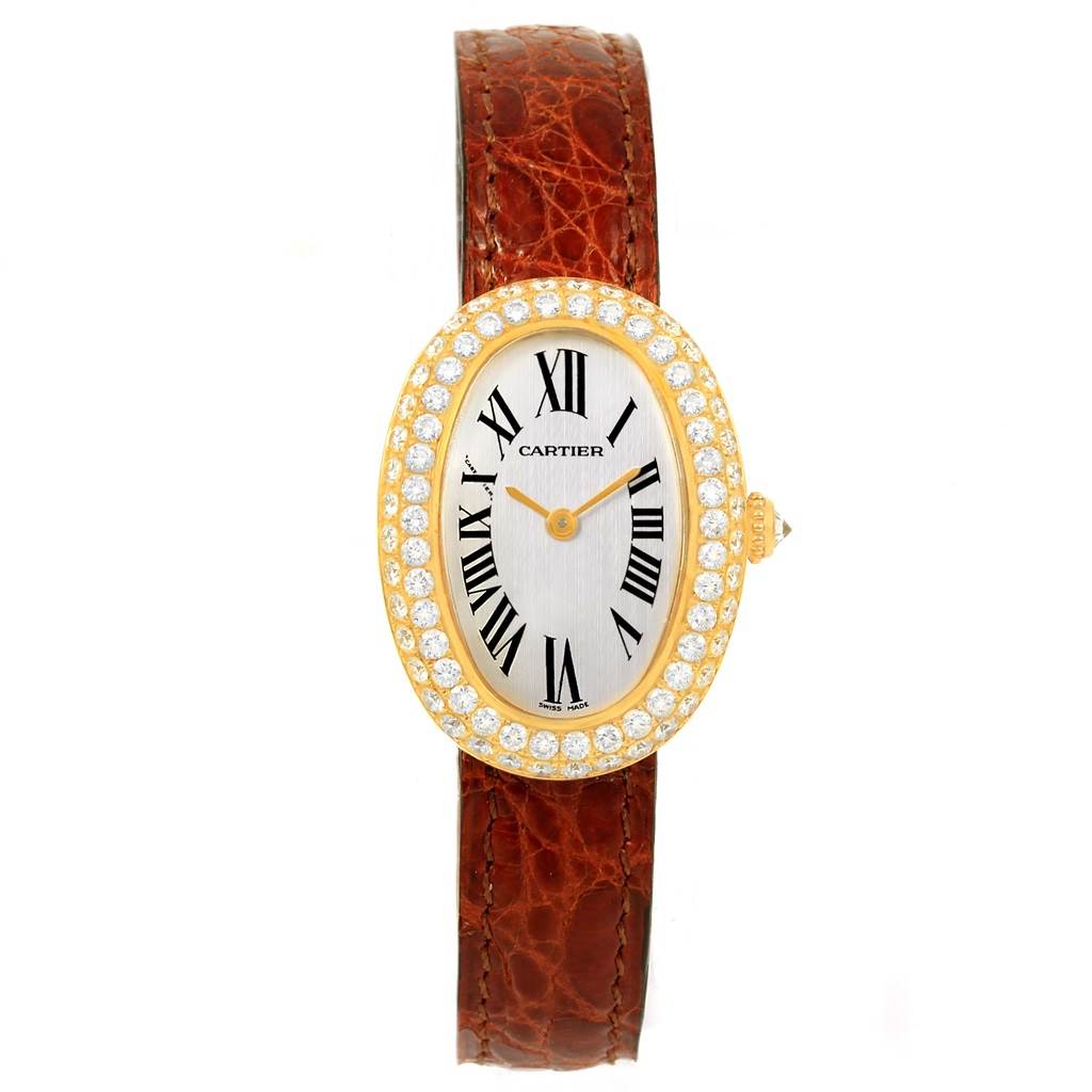 This image shows a frontal view of the Cartier Baignoire 1954 Women
s Yellow Gold Silver Dial 1954 Women
s Yellow Gold Silver Dial model watch, featuring its dial, bezel, and strap.