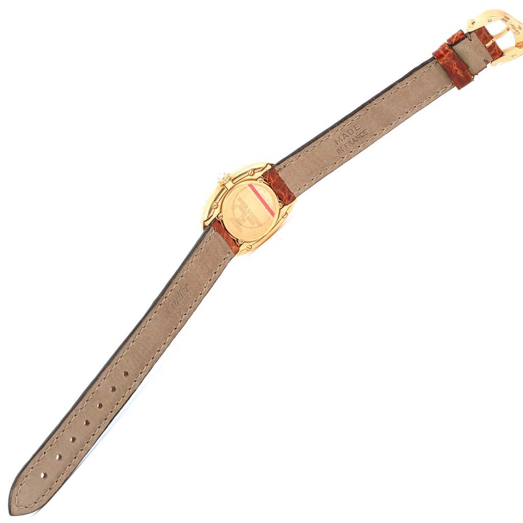 This image shows the back view of a Cartier Baignoire 1954 Women
s Yellow Gold Silver Dial 1954 Women
s Yellow Gold Silver Dial watch, highlighting the strap and case back.