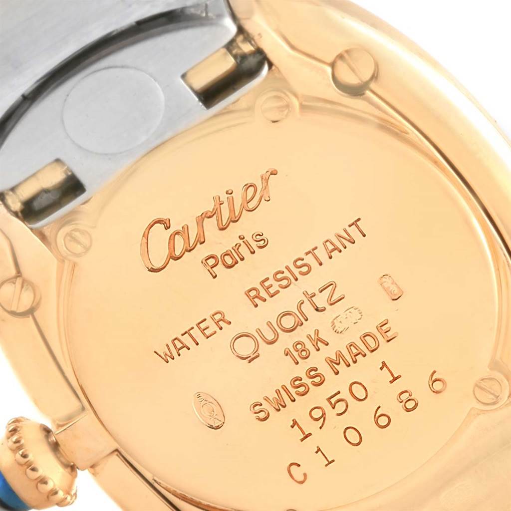 The image shows the back of a Cartier Baignoire W15045D8 Women's Yellow Gold Silver Dial W15045D8 Women's Yellow Gold Silver Dial model watch, highlighting its inscriptions and water-resistant feature.