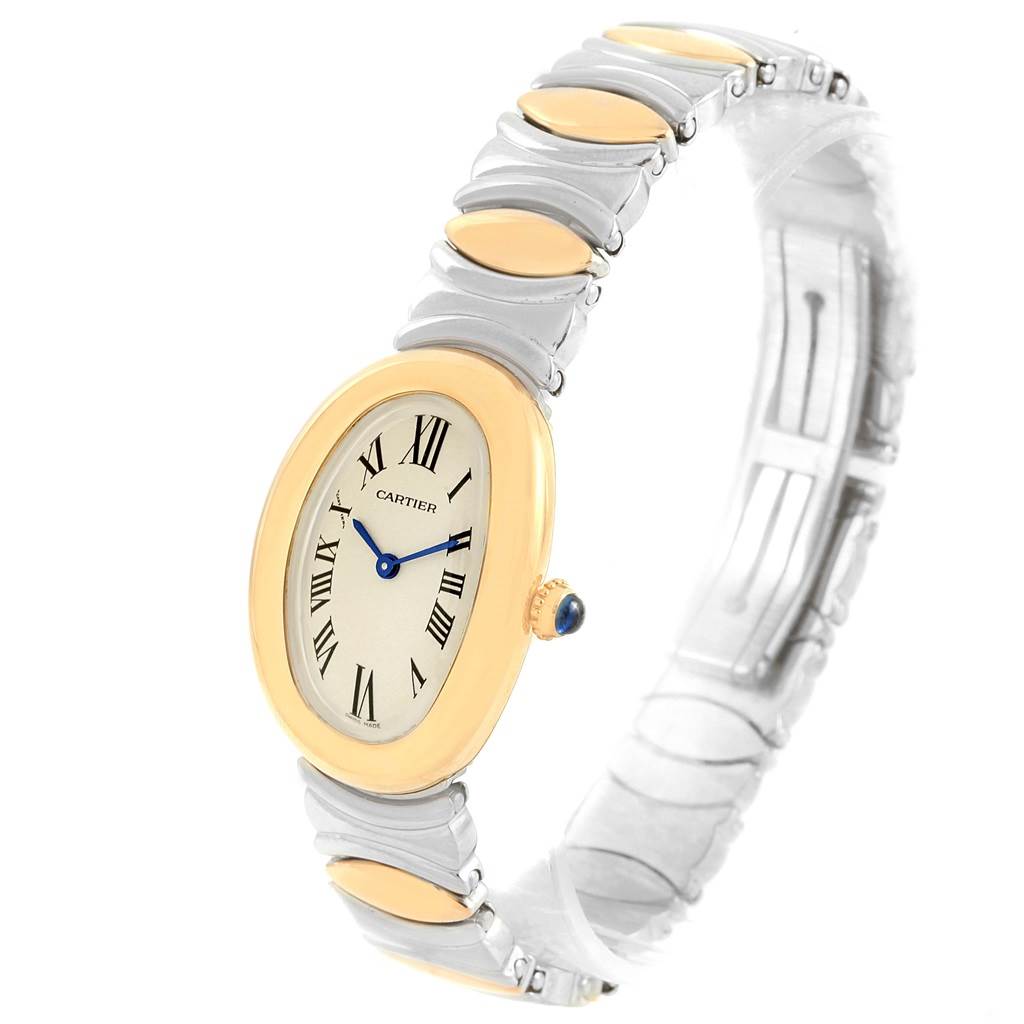 This image shows a Cartier Baignoire W15045D8 Women's Yellow Gold Silver Dial W15045D8 Women's Yellow Gold Silver Dial watch at a three-quarter angle, highlighting its oval dial, gold bezel, and distinctive bracelet.