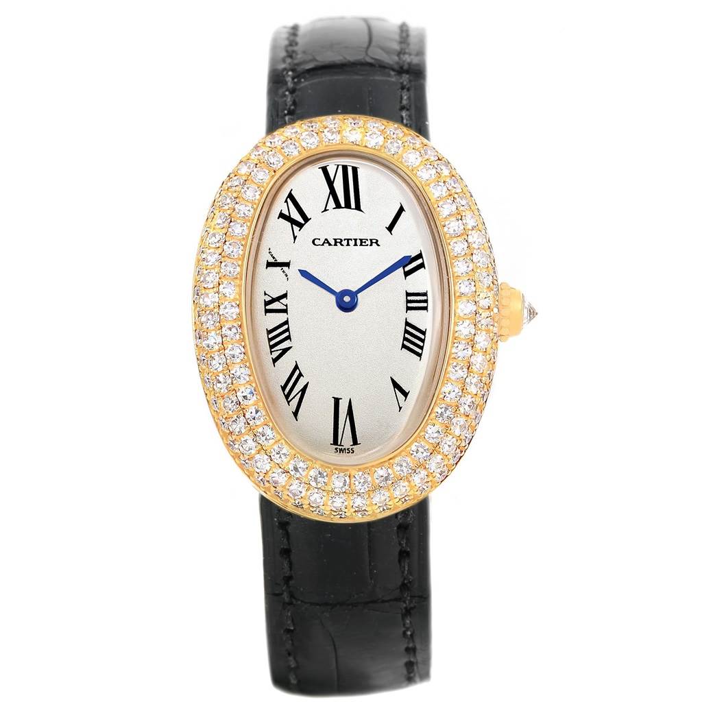 The Cartier Baignoire 1954 Women's Yellow Gold Silver Dial 1954 Women's Yellow Gold Silver Dial watch is shown from a top-down angle, displaying the face, diamond-encrusted bezel, and black leather strap.