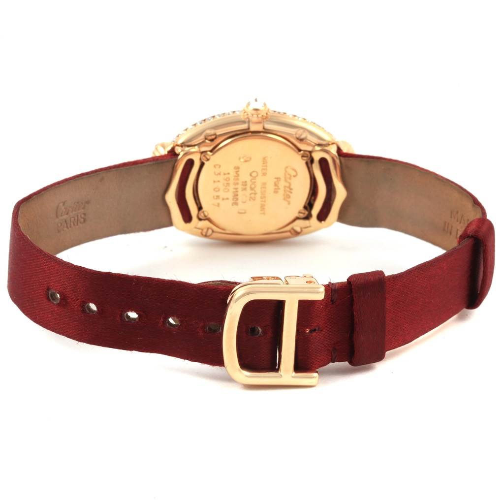 The image shows the back and strap of the Cartier Baignoire 1950 Women's Yellow Gold Silver Dial 1950 Women's Yellow Gold Silver Dial watch with its clasp and case back clearly visible.