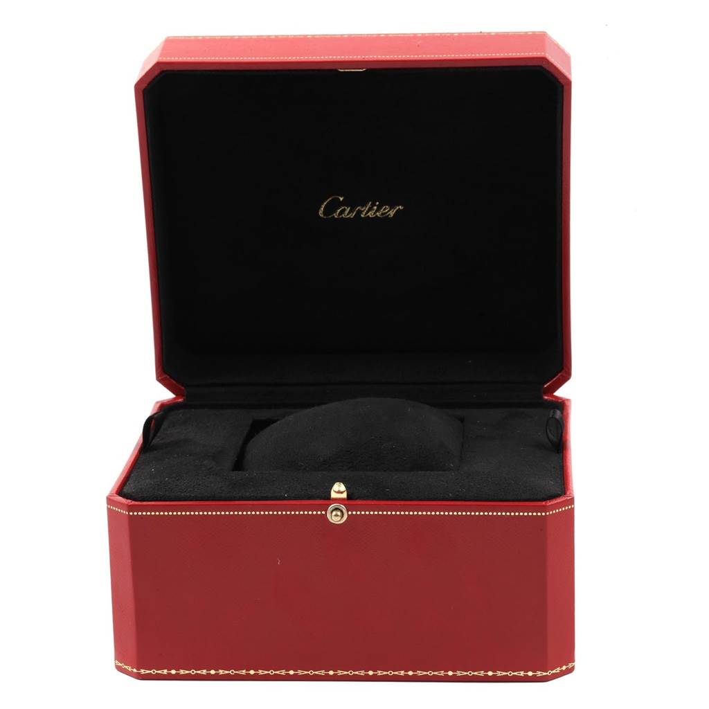 This image shows an empty red Cartier watch box, designed to hold the Baignoire model.