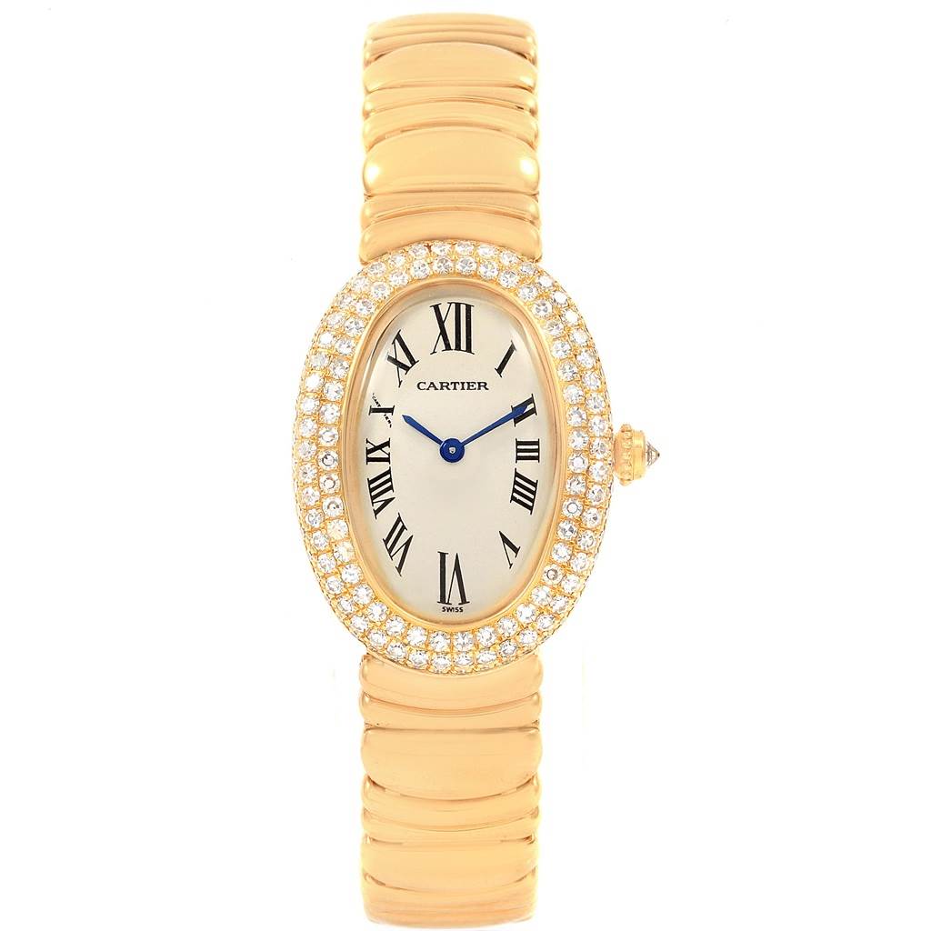 The image shows a front view of a Cartier Baignoire 1950 Women's Yellow Gold Silver Dial 1950 Women's Yellow Gold Silver Dial watch, highlighting its oval face with Roman numerals and a diamond-encrusted bezel.