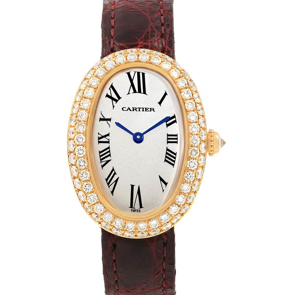 This image shows a Cartier Baignoire 1954 Women's Yellow Gold Silver Dial 1954 Women's Yellow Gold Silver Dial watch from a front view, featuring a diamond-studded bezel and a leather strap.