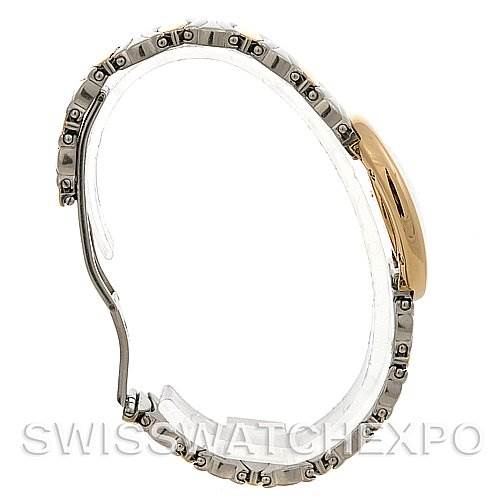 The image shows a side profile of the Cartier Baignoire W15045D8 Women
s Yellow Gold Silver Dial W15045D8 Women
s Yellow Gold Silver Dial watch, highlighting its band and case.