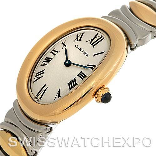 The image shows a close-up of the Cartier Baignoire W15045D8 Women
s Yellow Gold Silver Dial W15045D8 Women
s Yellow Gold Silver Dial watch
s dial, bezel, crown, and part of the bracelet from an angled side view.