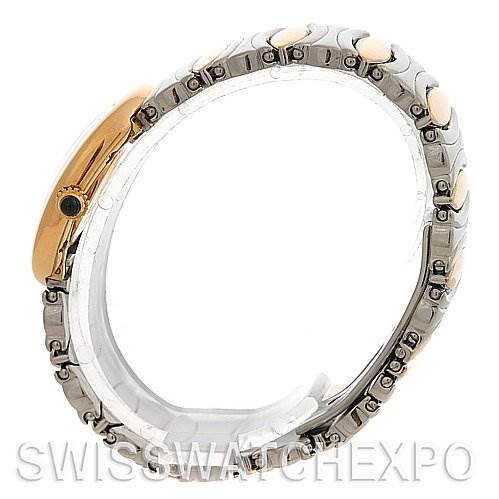 The image shows a side view of a Cartier Baignoire W15045D8 Women's Yellow Gold Silver Dial W15045D8 Women's Yellow Gold Silver Dial watch, focusing on its bezel, crown, and part of the bracelet.