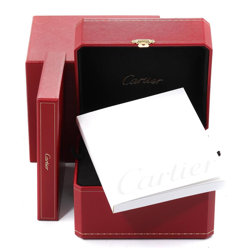 The image shows the red box and packaging for the Cartier Baignoire W15045D8 Women's Yellow Gold Silver Dial W15045D8 Women's Yellow Gold Silver Dial watch, including an open case and a booklet.