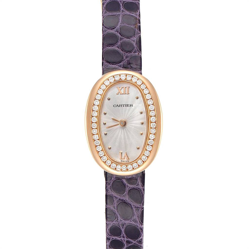 This image shows a front view of the Cartier Baignoire 2333 Women's Rose Gold Silver Dial 2333 Women's Rose Gold Silver Dial watch featuring an oval dial, gold case, diamond bezel, and leather strap.
