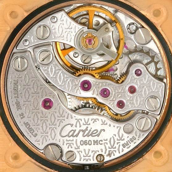 The image shows the intricate internal mechanism of a Cartier Baignoire Women's Rose Gold Silver Dial Women's Rose Gold Silver Dial watch, viewed from the back.