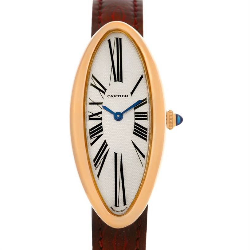 The Cartier Baignoire Women's Rose Gold Silver Dial Women's Rose Gold Silver Dial watch is shown from a top-down angle, displaying its elongated oval face, Roman numerals, and leather strap.