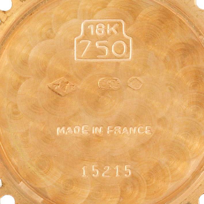 This image shows the back casing of a Cartier Baignoire Women's Rose Gold Silver Dial Women's Rose Gold Silver Dial watch, specifically highlighting the "18K 750" hallmark and the "Made in France" inscription.