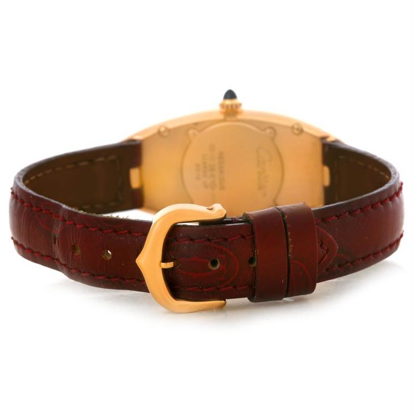 This image shows the back view of a Cartier Baignoire Women's Rose Gold Silver Dial Women's Rose Gold Silver Dial watch, focusing on the leather strap and buckle.