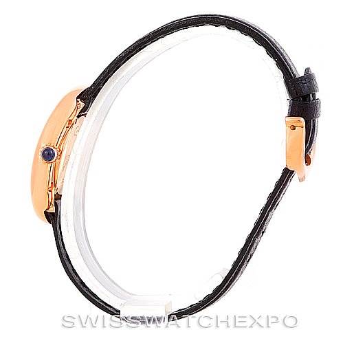 The image shows a side view of the Cartier Baignoire Women's Rose Gold Pink Dial Women's Rose Gold Pink Dial watch, highlighting the watch's profile, case, and strap.