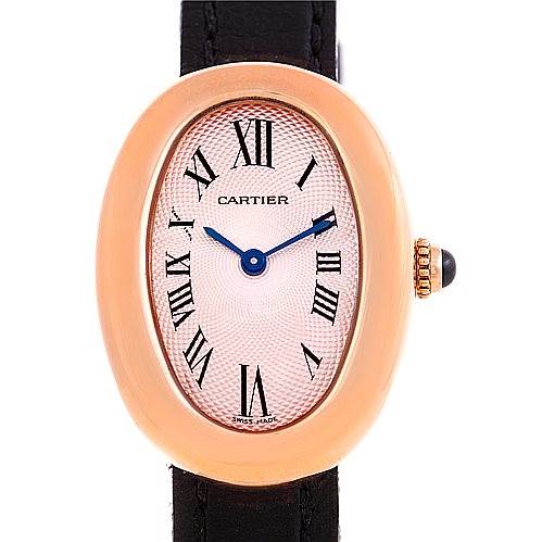 The image shows a Cartier Baignoire Women's Rose Gold Pink Dial Women's Rose Gold Pink Dial watch from a front angle, displaying its dial, hands, and part of the strap.