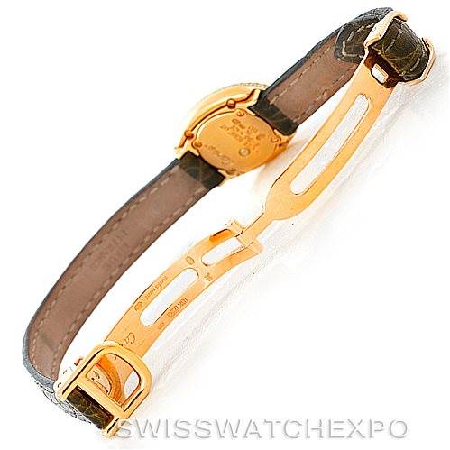 This image shows the underside and clasp of a Cartier Baignoire WB501651 Women's Yellow Gold Silver Dial WB501651 Women's Yellow Gold Silver Dial watch.