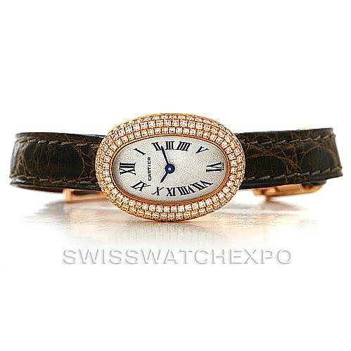 The image shows a Cartier Baignoire WB501651 Women's Yellow Gold Silver Dial WB501651 Women's Yellow Gold Silver Dial watch with a front view, showcasing its oval face, Roman numerals, diamond bezel, and leather strap.