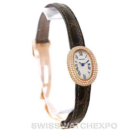 This image shows a Cartier Baignoire WB501651 Women's Yellow Gold Silver Dial WB501651 Women's Yellow Gold Silver Dial watch at an angled side view, highlighting its oval face, Roman numerals, and leather strap.