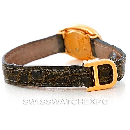 The image shows the back angle of the Cartier Baignoire WB501651 Women's Yellow Gold Silver Dial WB501651 Women's Yellow Gold Silver Dial watch, focusing on the leather strap and gold clasp.