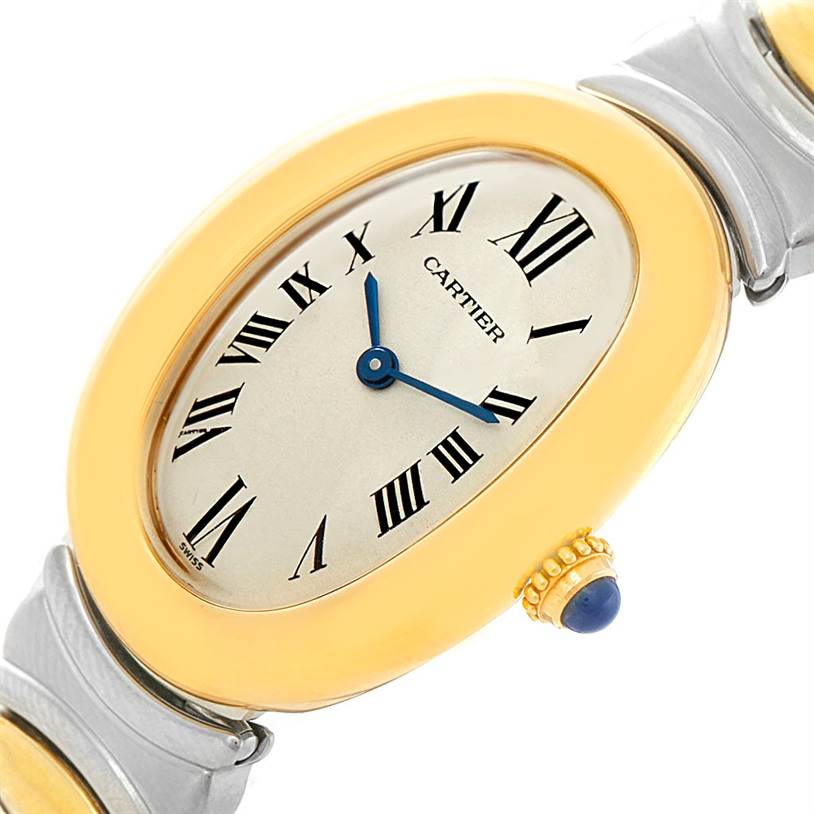 This image shows a close-up view of the Cartier Baignoire W15045D8 Women's Yellow Gold Silver Dial W15045D8 Women's Yellow Gold Silver Dial watch face and part of its bracelet.