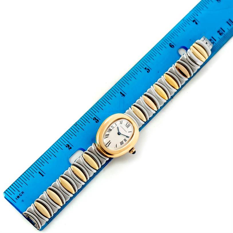 The image shows a Cartier Baignoire W15045D8 Women's Yellow Gold Silver Dial W15045D8 Women's Yellow Gold Silver Dial model watch, laid flat and aligned with a ruler.