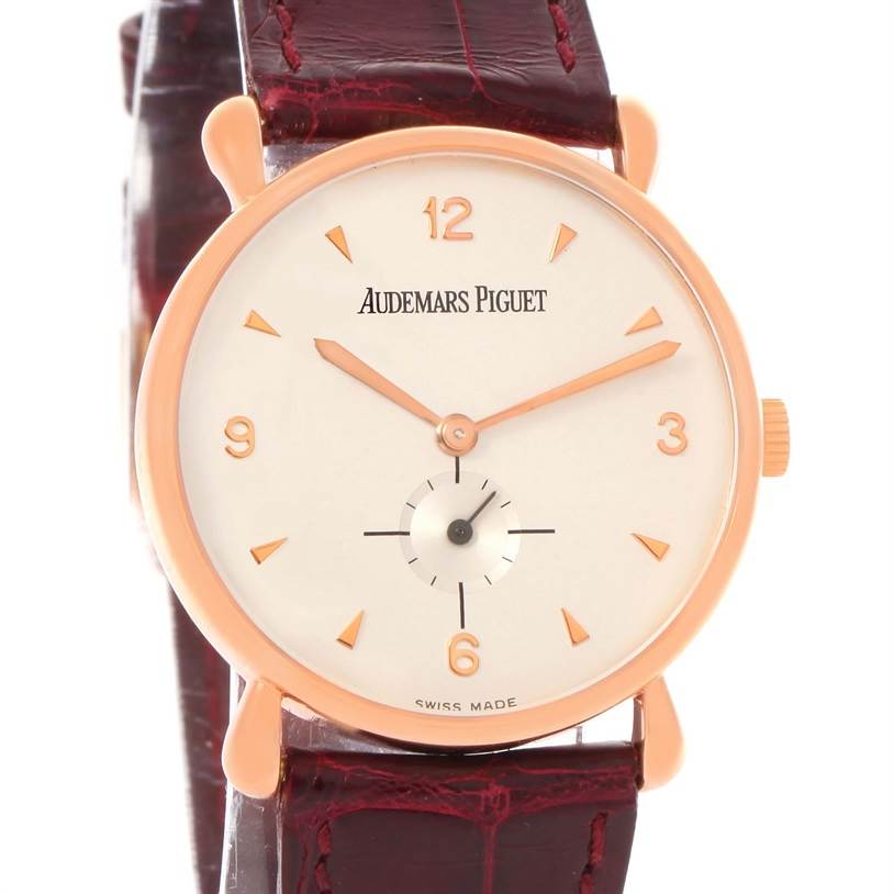 The image shows a front view of a Vintage Audemars Piguet watch with rose gold case and brown leather strap.