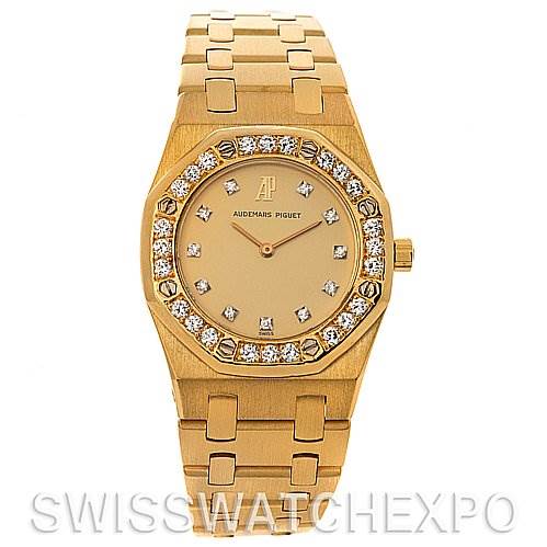 This image shows a front view of a gold Audemars Piguet Royal Oak Women's Yellow Gold Champagne Dial Women's Yellow Gold Champagne Dial watch, highlighting the bracelet, bezel, and dial with diamond markers.