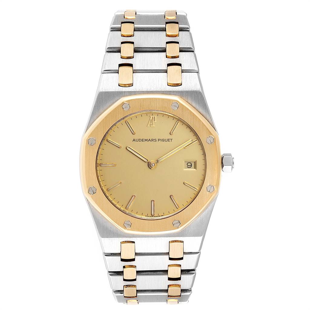 The image shows a front view of the Audemars Piguet Royal Oak Men's Steel and Gold (two tone) Champagne Dial Men's Steel and Gold (two tone) Champagne Dial watch, highlighting its dial, bracelet, and bezel.