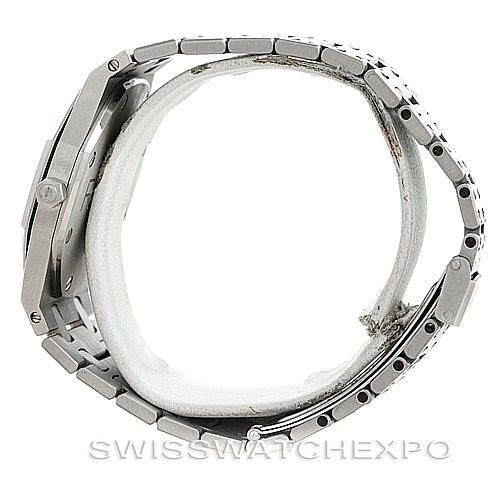 The image shows a side view of the Audemars Piguet Royal Oak Men's Stainless Steel Silver Dial Men's Stainless Steel Silver Dial watch, highlighting its case thickness and bracelet links.