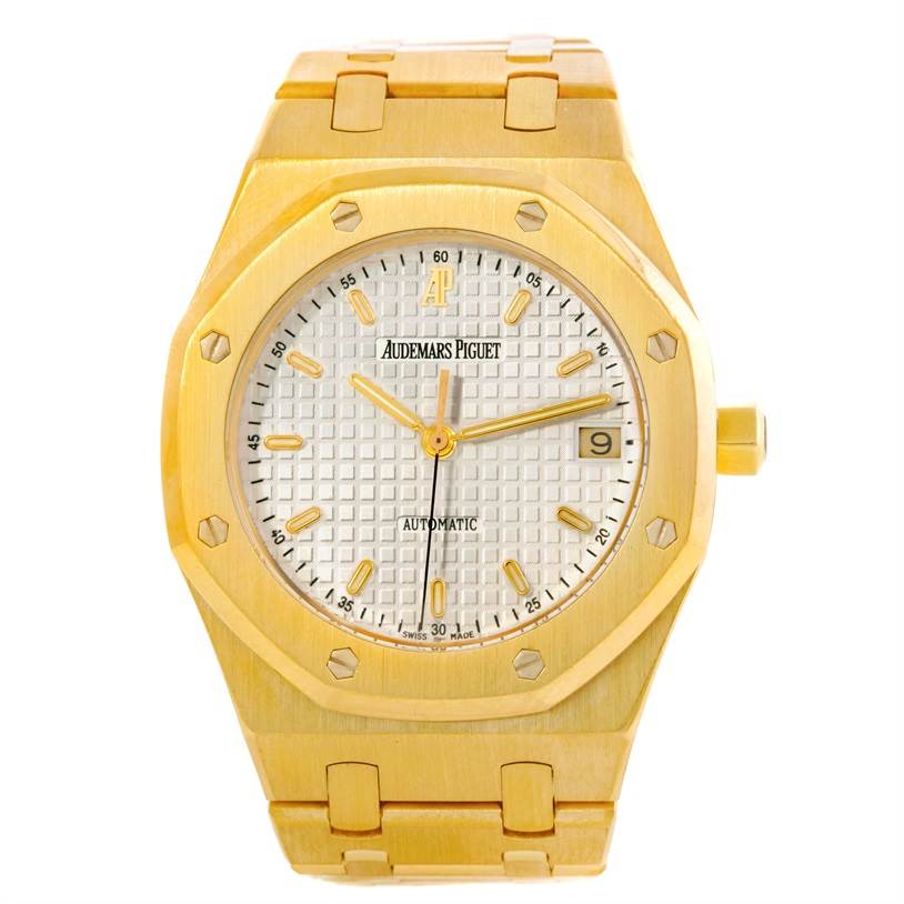 The image shows a front view of an Audemars Piguet Royal Oak Men's Yellow Gold Beige Dial Men's Yellow Gold Beige Dial watch, highlighting the dial, bezel, and bracelet.