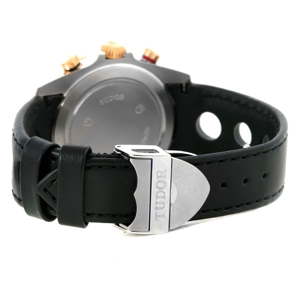 The image shows the rear view of a Tudor Grantour 20551N Men's Steel and Gold (two tone) Black Dial 20551N Men's Steel and Gold (two tone) Black Dial watch, focusing on the black leather strap and clasp.