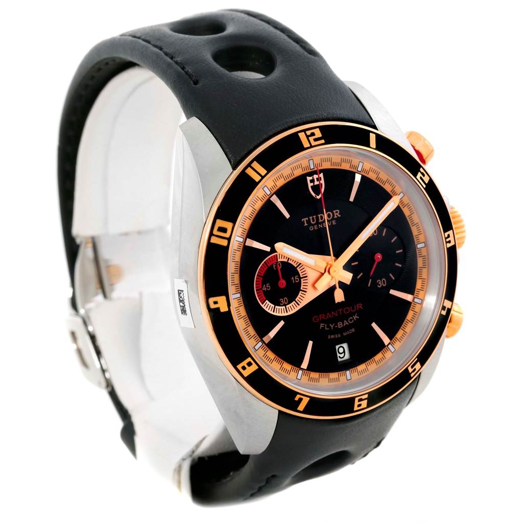 The image shows a Tudor Grantour 20551N Men's Steel and Gold (two tone) Black Dial 20551N Men's Steel and Gold (two tone) Black Dial watch at a three-quarter view, highlighting the dial, bezel, case, and strap.