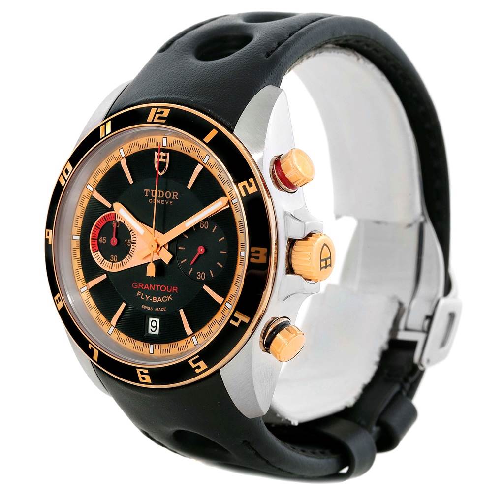 The Tudor Grantour 20551N Men's Steel and Gold (two tone) Black Dial 20551N Men's Steel and Gold (two tone) Black Dial watch is shown at a slight side angle, displaying its face, bezel, and strap.