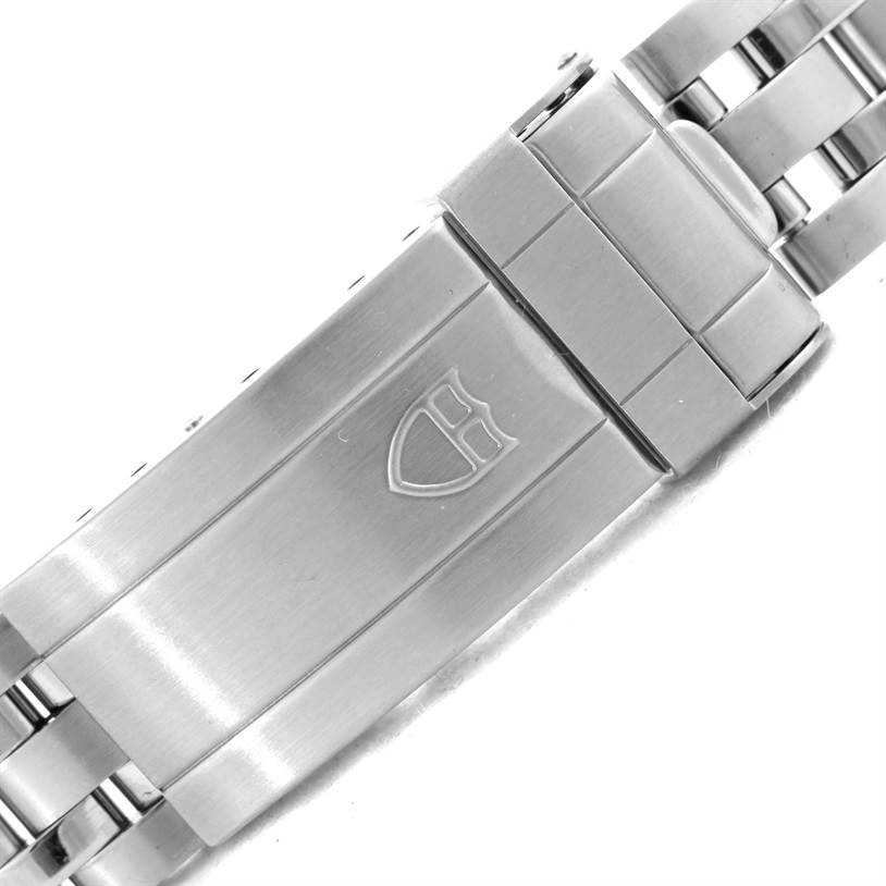 This image shows a close-up of the clasp and part of the metal bracelet of the Tudor Hydronaut 89190 Men
s Stainless Steel Yellow Dial 89190 Men
s Stainless Steel Yellow Dial watch.